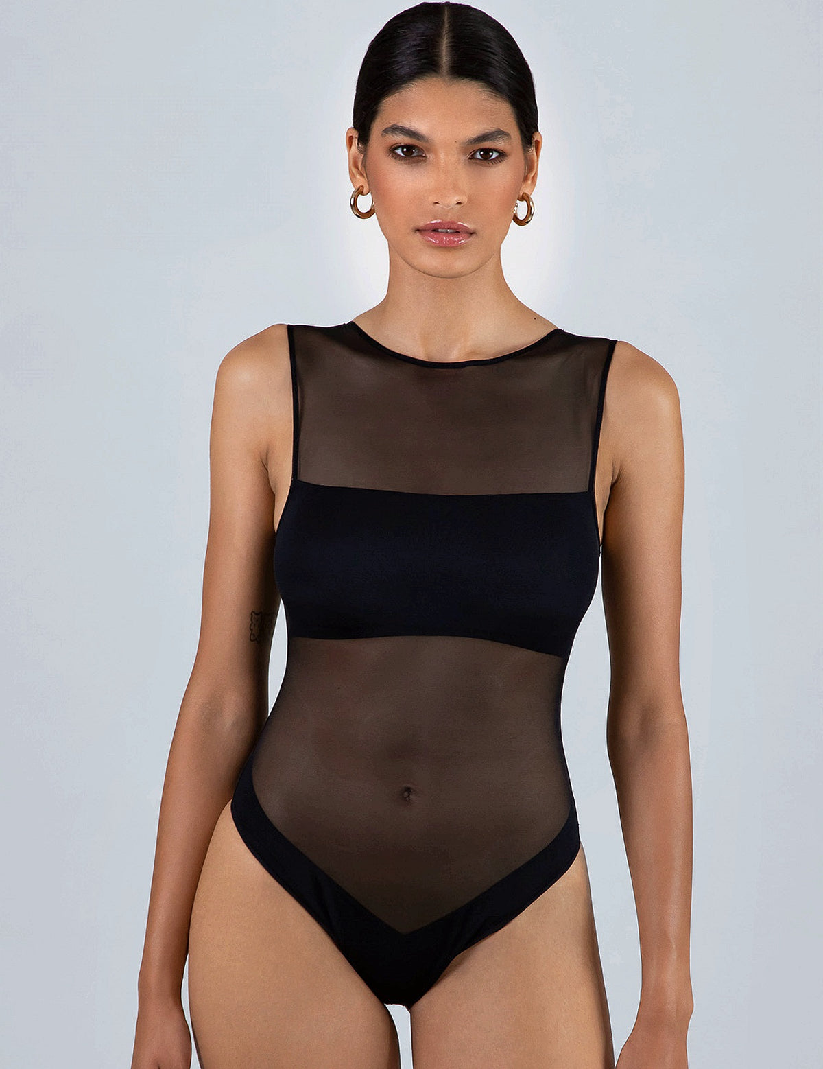 Skim zwart body

Body, zwart, comfortabel, Beata lingerie, exclusieve lingerie, elegant, luxe lingerie online