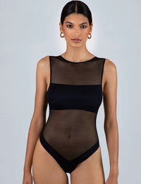 Skim zwart body

Body, zwart, comfortabel, Beata lingerie, exclusieve lingerie, elegant, luxe lingerie online