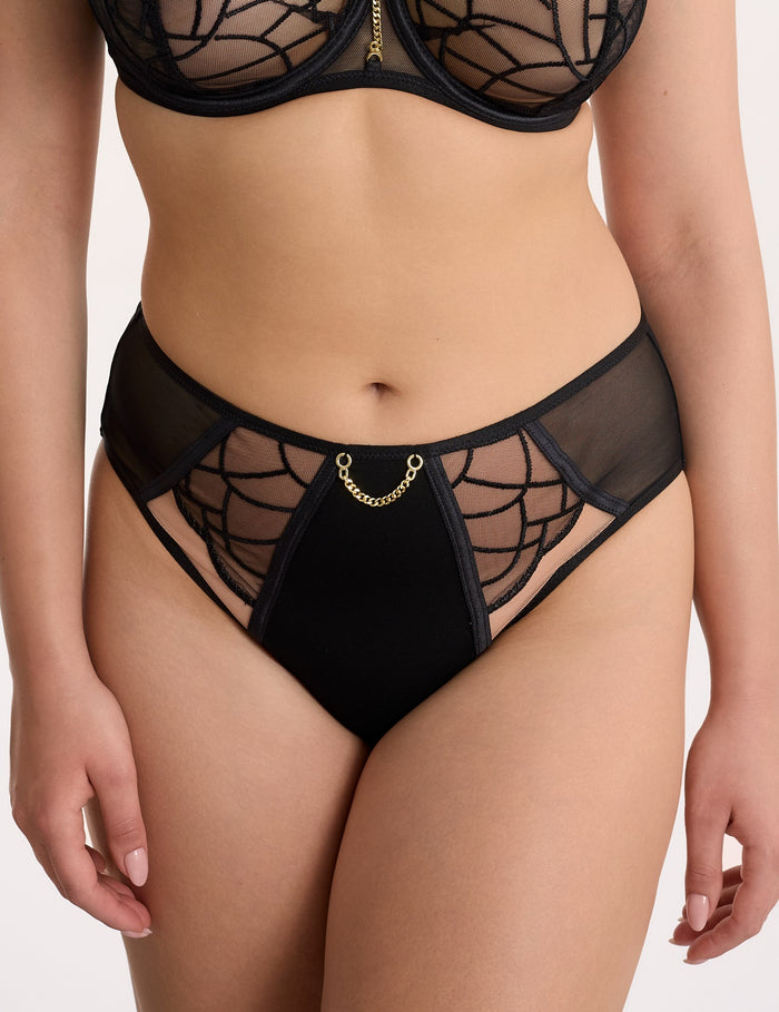 Regina zwart C124 hoge slip

Hoge slip, hoge tailleslip, grote maten, corrigerende slip, dames slip, damesondergoed, fijne pasvorm, katoen kruisje, kant details, online kopen, vrouwelijke slip, Europese merken, elastische slip met luxe afwerking, zachte ondersteuning, elegante afwerking, Beata lingerie, luxe lingerie online, uniek, stijlvol, tijdloos, zwart
